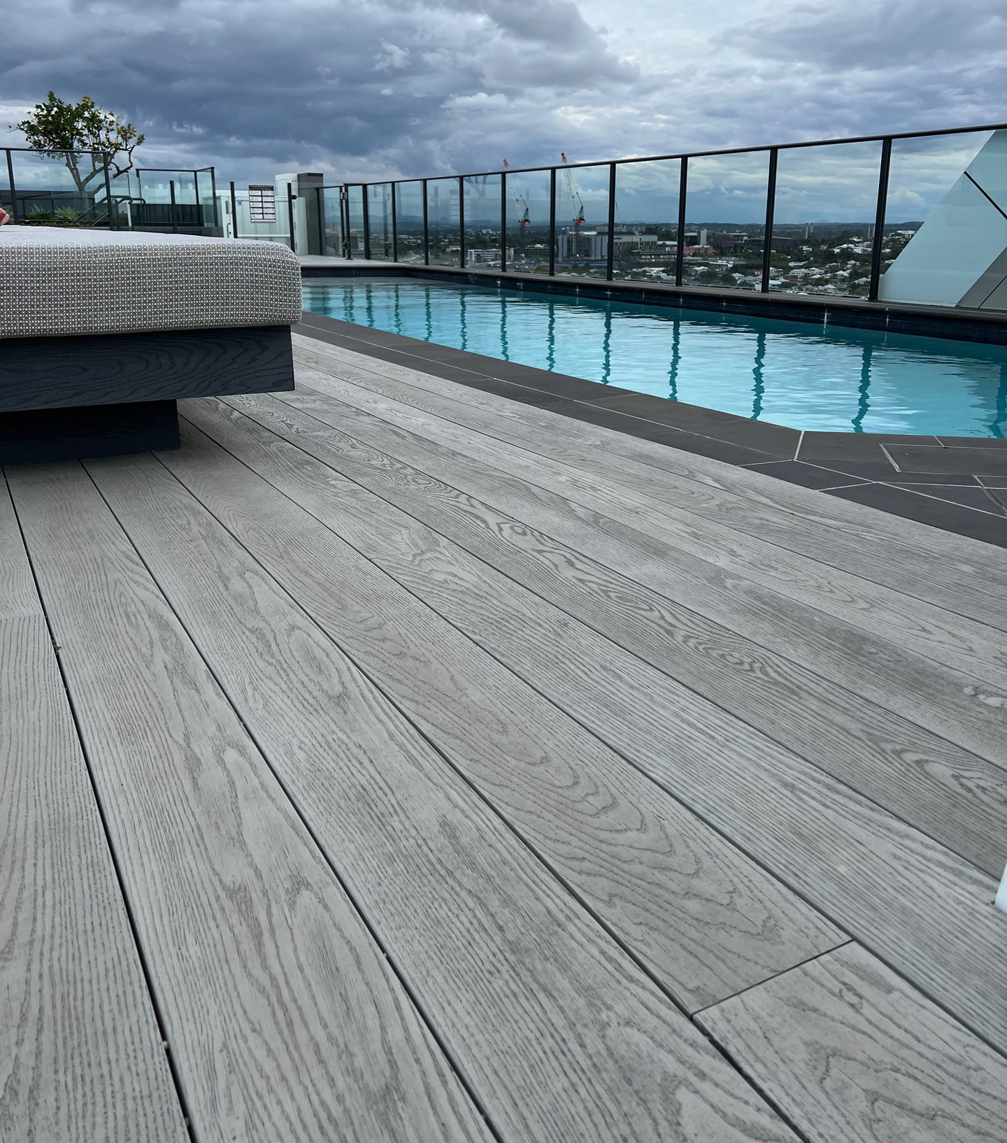 Rooftop lap pool with fake decking